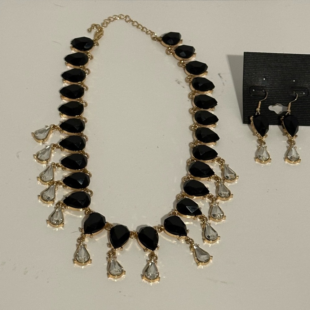 Gold Tone Black Pear Shaped Stones with Clear Teardrops Necklace and Earrings
